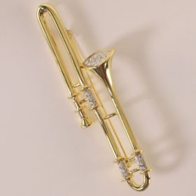 Broche: Trombone 90 Gl + Strass